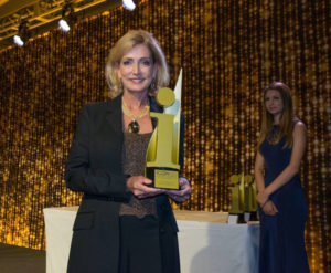 Jo-Anne Redwood accepts the BIA 2016 Marketing Professional of the Year award.